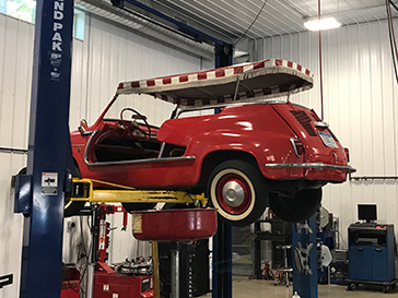 classic red bug | Tri City Auto Repair